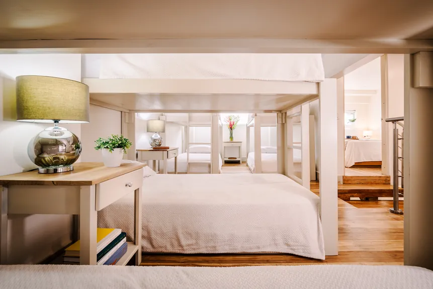 Bunk room with queen bed in the Bunkhouse Suite