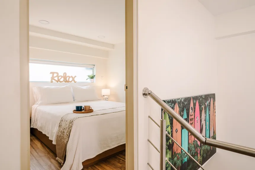 Queen bed in the Private Bunkhouse Suite