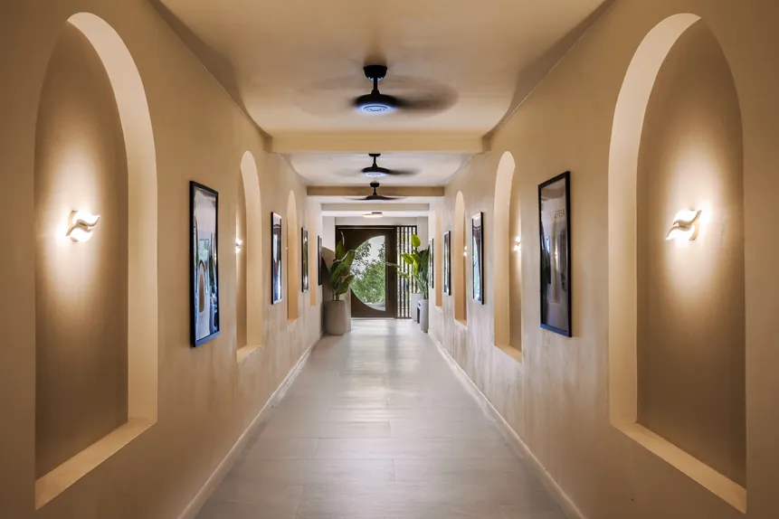 Arched hallway with warm lighting